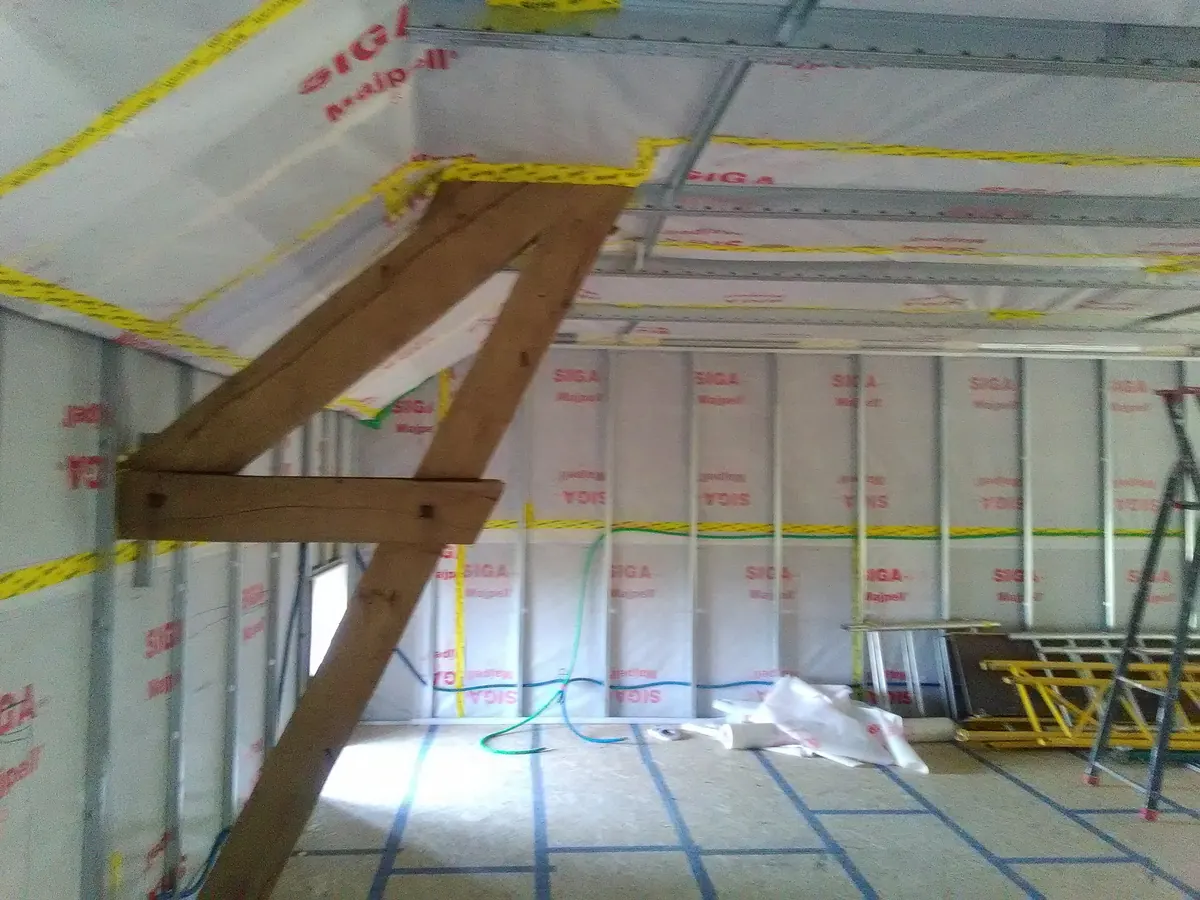 Isolation sous rampants avec membrane et ossature